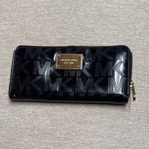 Michael Kors Black and Gold Zip Wallet